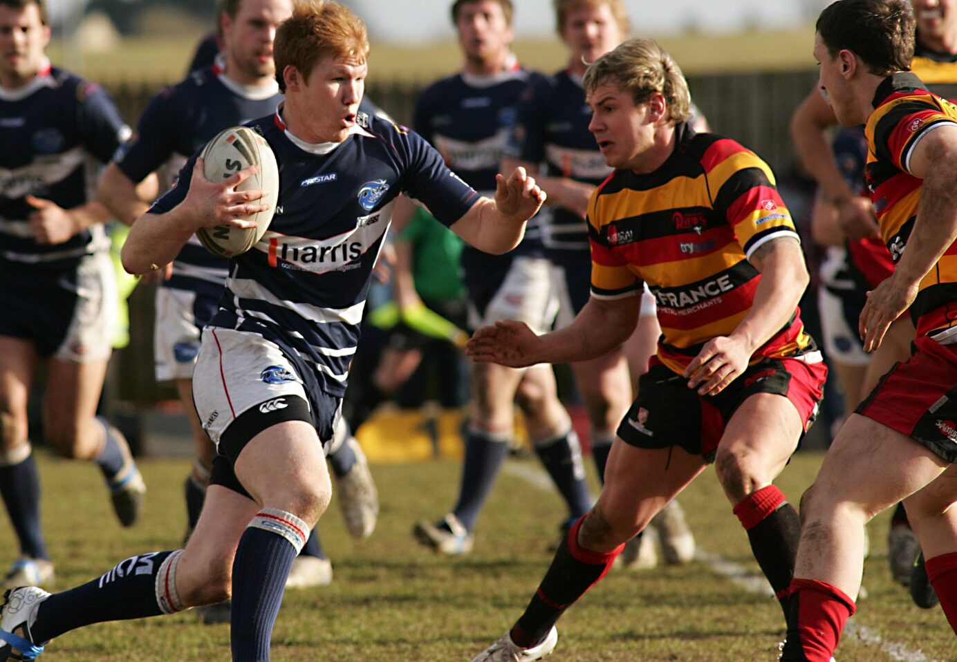 2010 - Dewsbury v Featherstone - Featherstones Ian Hardman drives on against Dominic Brambani & Haynes